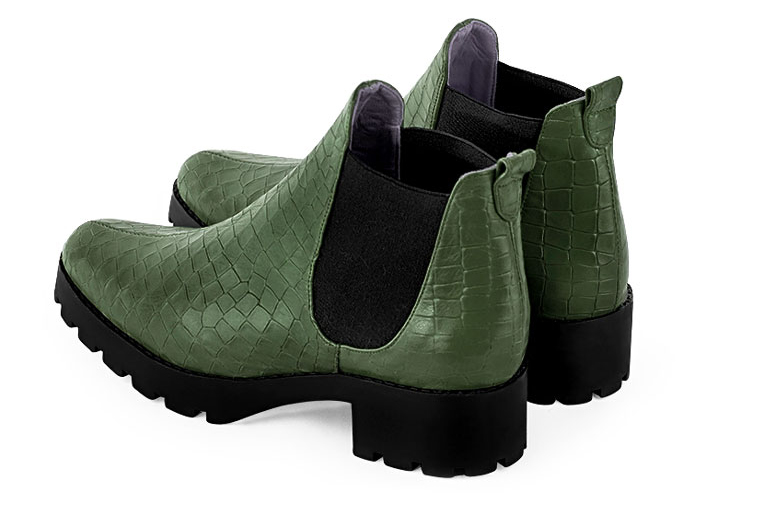 Forest green and matt black women's ankle boots, with elastics. Round toe. Low rubber soles. Profile view - Florence KOOIJMAN